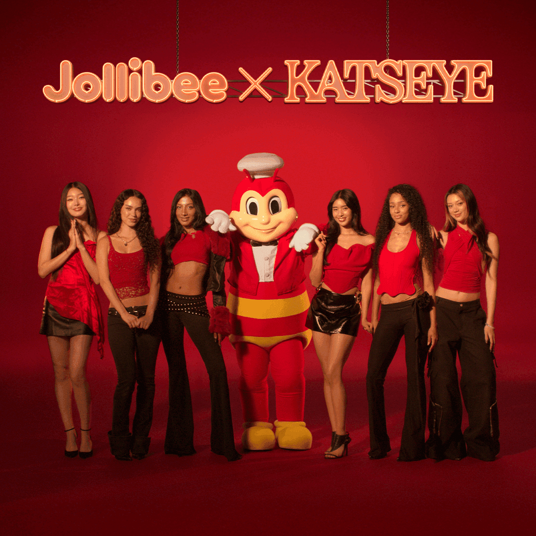 Jollibee mascot and KATSEYE standing on a red background with Jollibee x KATSEYE text