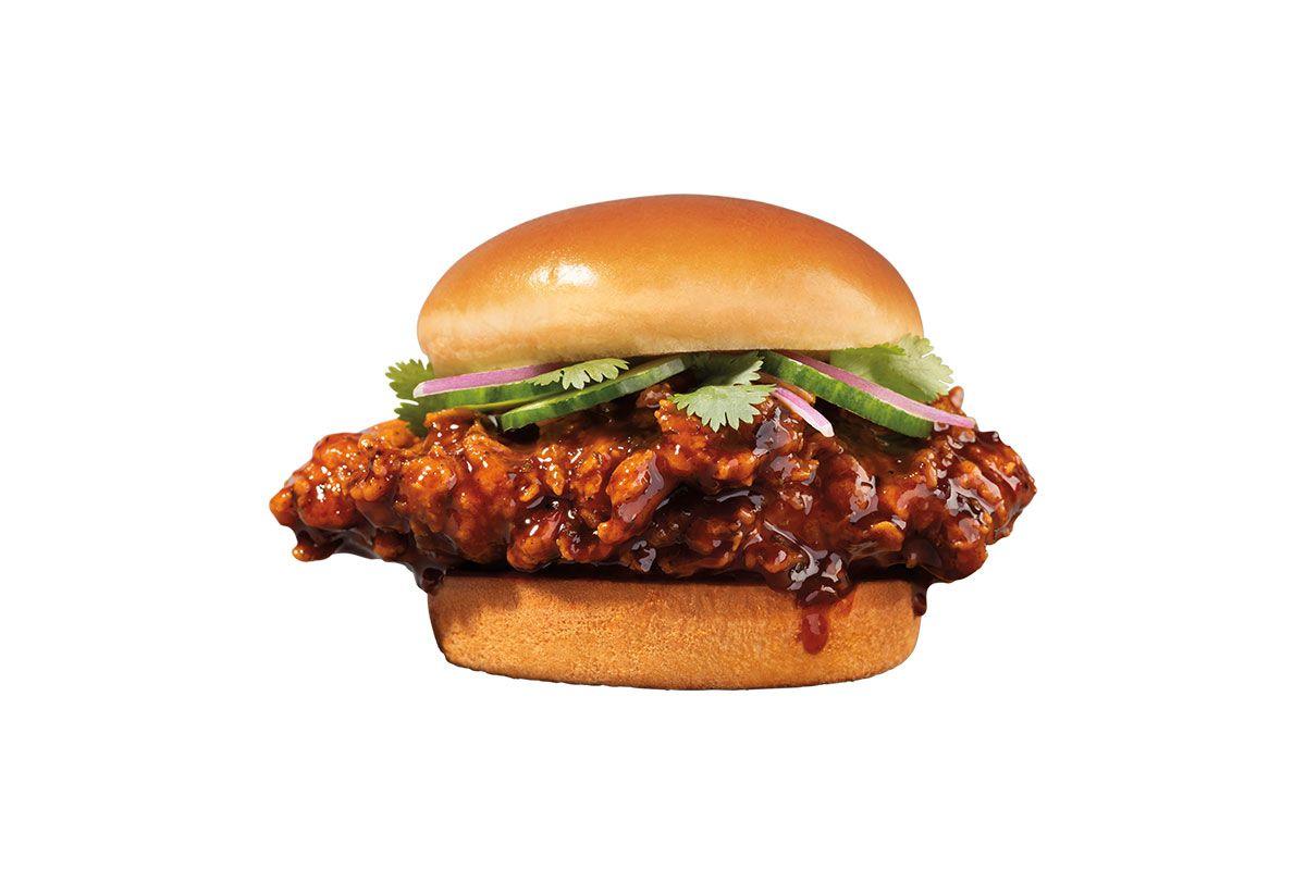 Jollibee KBBQ chicken sandwich on a white background