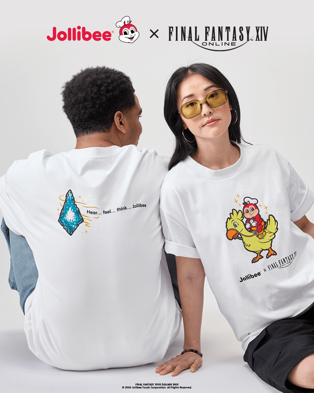 Two people wearing Jollibee white t-shirts with Jollibee x FINAL FANTASY XIV logo on a white background.